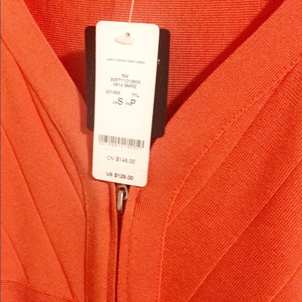 Size small bodycon Bebe dress. Never worn.